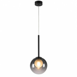 suspension flora en verre ambré avec laiton allumée, lumière chaude à travers la boule dépolie
