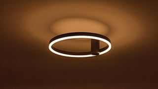 Plafonnier noir Ø40 cm Lysrum sur tube de 12 cm, allumé au plafond