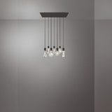 plafonnier 7 ampoules, suspension moderne noire, suspension en verre transparent, luminaire plafond design, suspension salle à manger