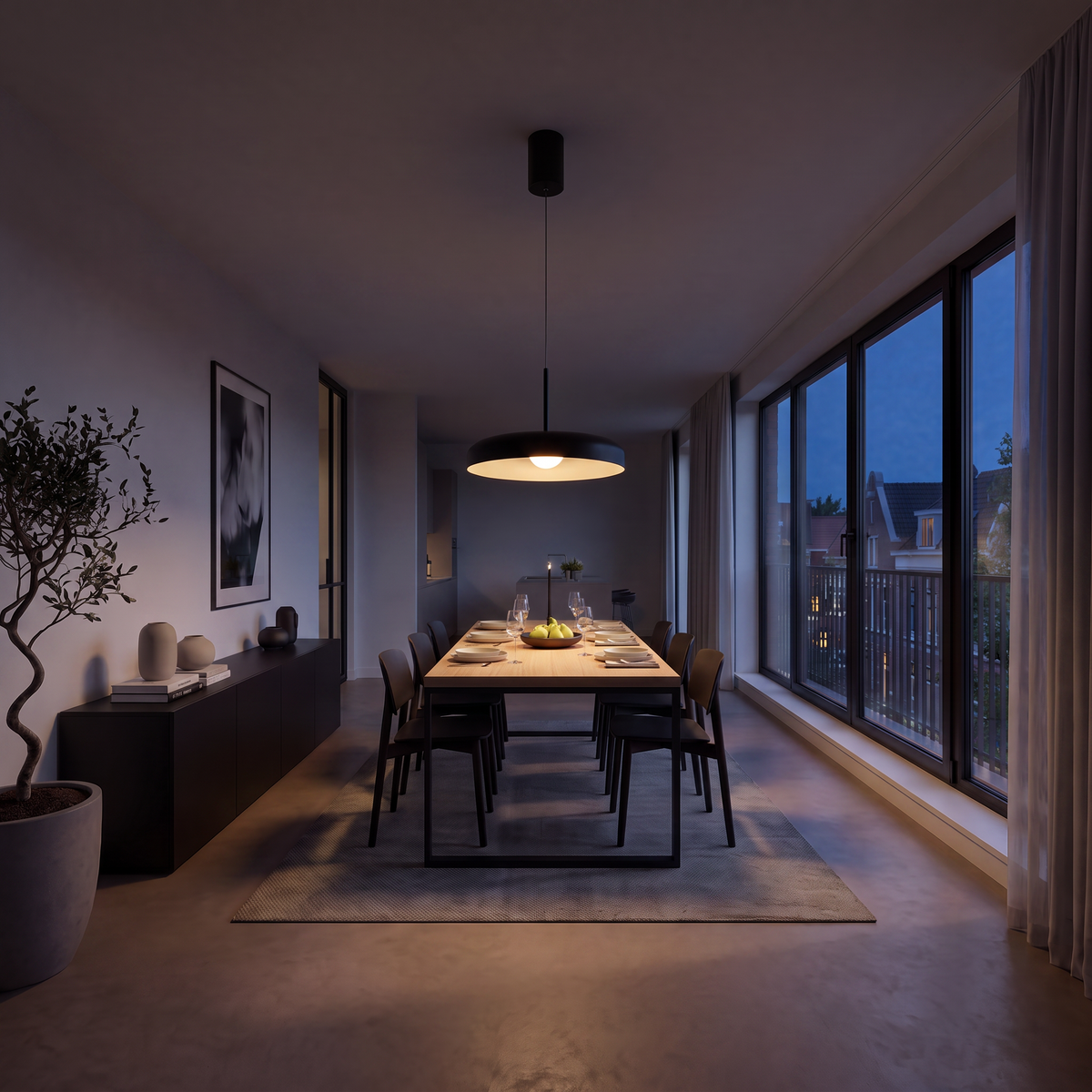 suspension noire dånsk en lumière d'ambiance au-dessus de la table le soir