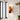 Applique murale rétro Fårverig orange et bordeaux dans une entrée, au-dessus d'une console