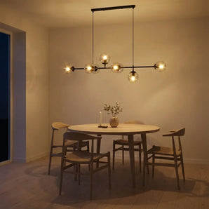 suspension moderne, suspension table à manger, suspension cuisine noire, suspension cuisine dorée, suspension au-dessus îlot